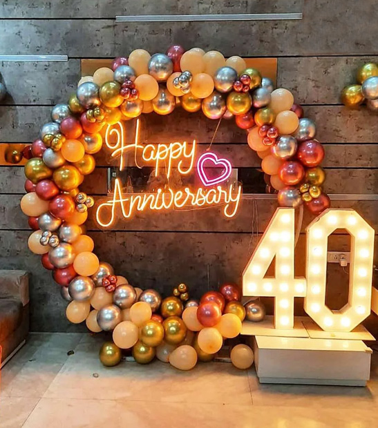 Elegant anniversary dinner setup with warm lighting and floral styling